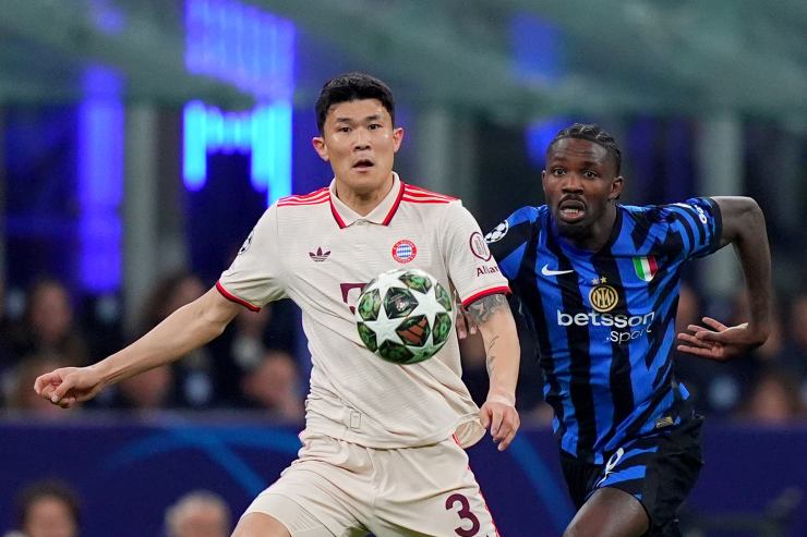 Kim Min-jae e Marcus Thuram nel corso di una partita di Champions League tra Inter e Bayern Monaco