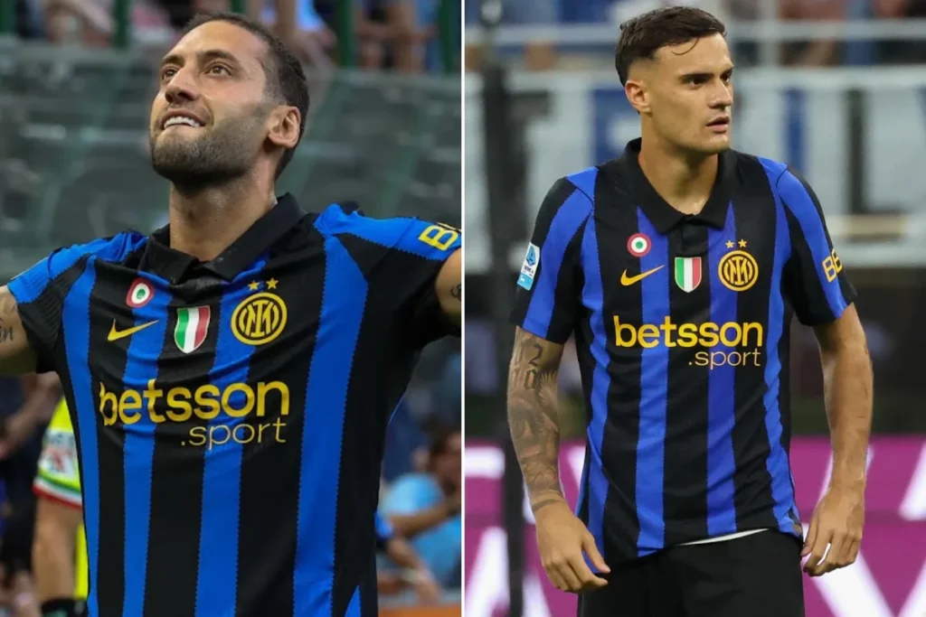 Calhanoglu in maglia Inter a righe blu e nere con sponsor Betsson durante una partita